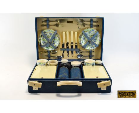 Vintage Picnic Hamper By Brexton Housed in original blue faux leather case with cream hardware. Brexton manufacturers mark to