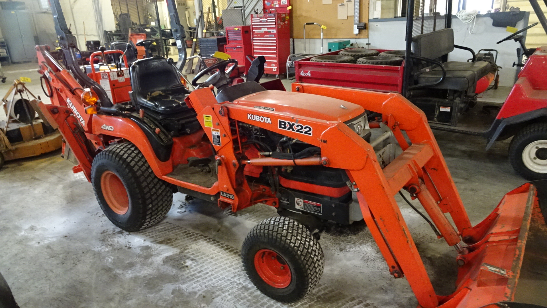 KUBOTA MDL. BX22 22 HP DIESEL TRACTOR WITH KUBOTA LA210 FRONT BUCKET