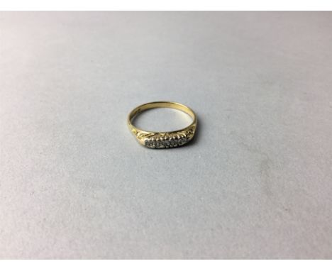 DIAMOND FIVE STONE RING, set with a row of five round cut diamonds, marked 18 ct, size R, 3.1g