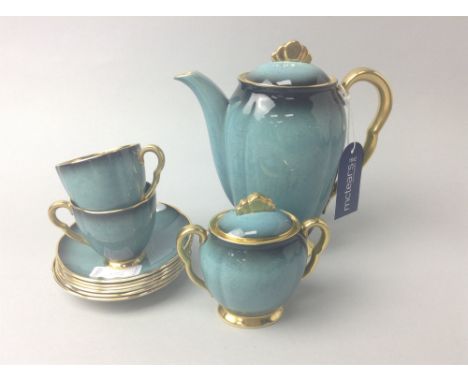 CARLTON WARE PART COFFEE SERVICE, the blue mottled ground with gilt rim, handle and interior, comprising coffee pot, five cup