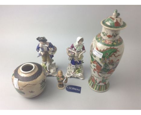 TALL CHINESE CRACKLE GLAZE VASE, with cover, along with another Chinese jar, two continental porcelain figures and two Hummel