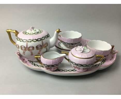 FRENCH PORCELAIN TEA FOR TWO SERVICE, including a shaped oval tray