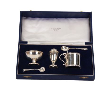 Modern silver three piece cruet set, comprising open salt, pepper shaker and mustard pot with cover, with two condiment spoon