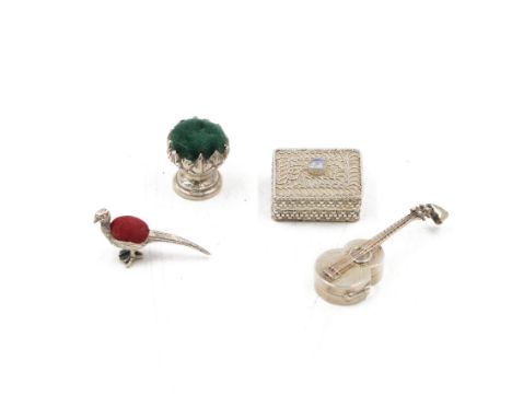Group of modern silver novelties, including two pin cushions, one in the form of a pheasant with red cushion back and one in 
