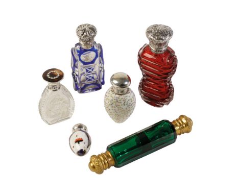 COLLECTION OF VICTORIAN AND LATER SCENT BOTTLES, comprising a cranberry cut glass and silver top scent, a blue flash-cut glas
