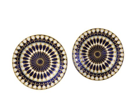 PAIR OF FRENCH ENAMEL PERSIAN MARKET DISHES, 19TH CENTURY, decorated with radiating stylised bands, enriched with gilt and tu