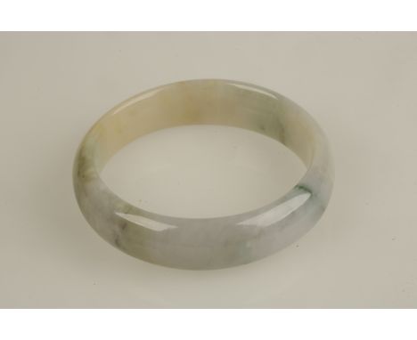 MODERN "JADITE" BANGLE, the  pale green coloured bangle approximately 7cm outer diameter