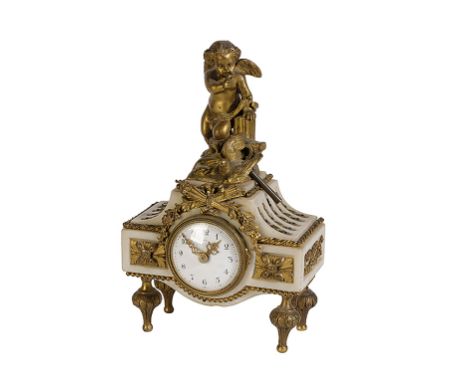 A LOUIS XVI STYLE WHITE MARBLE AND ORMOLU-MOUNTED MANTEL CLOCK with a simple drum movement and a white enamel dial with Arabi