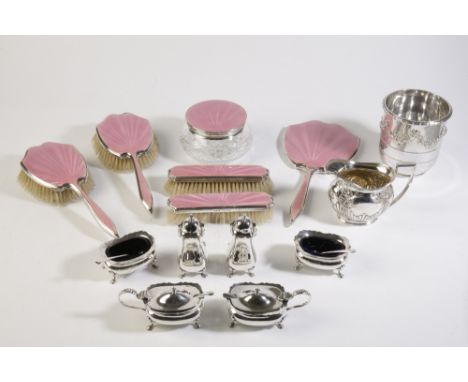 A COLLECTION OF SILVER, comprising an Art Deco six piece silver and pink guilloche enamel dressing table set, a silver cream 