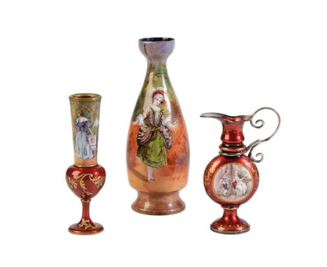 LIMOGES ENAMEL EWER, LATE 19TH CENTURY, the flatted ovoid sides painted with panels depicting courting couples, reserved agai