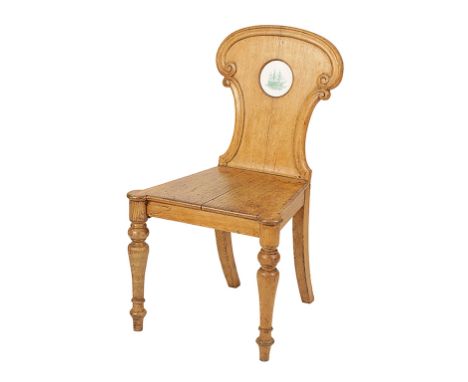 EARLY VICTORIAN OAK HALL CHAIR stamped "Gillow", the escutcheon-shaped back inset with a circular ceramic panel transfer prin