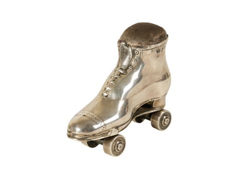 EDWARDIAN NOVELTY SILVER PIN CUSHION, by Crisford &amp; Norris Ltd, Birmingham, 1909, modelled in the form of a roller skate,