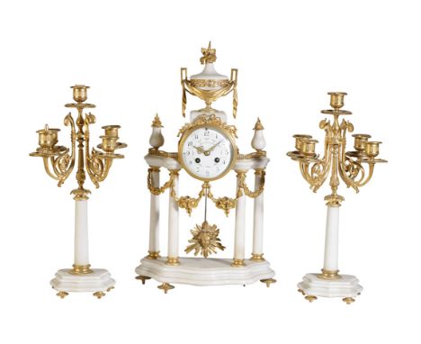 FRENCH WHITE MARBLE AND GILT CLOCK GARNITURE, the convex dial with Arabic numerals and painted floral swags, inscribed " Deme