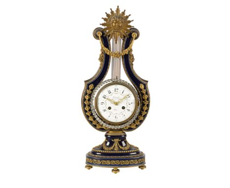 FRENCH PORCELAIN AND ORMOLU LYRE CLOCK, the white enamel dial with floral swags, inscribed "Causard Hger du Roy", the movemen