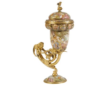 AUSTRIAN SILVER GILT AND ENAMEL CUP AND COVER, VIENNA, CIRCA 1900, the domed cover and sides painted with allegorical scenes,