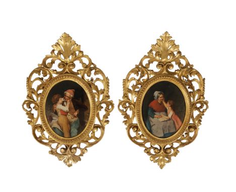 CONTINENTAL SCHOOL, 19th century A pair of portrait studies of elders with young children, oil on board, 24.5cm x 18.5cm (ova