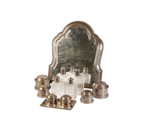 A FRENCH SILVER DRESSING TABLE/VANITY SET by A. Aucoc, circa 1890/1900. Comprising an easel-backed dressing table mirror with