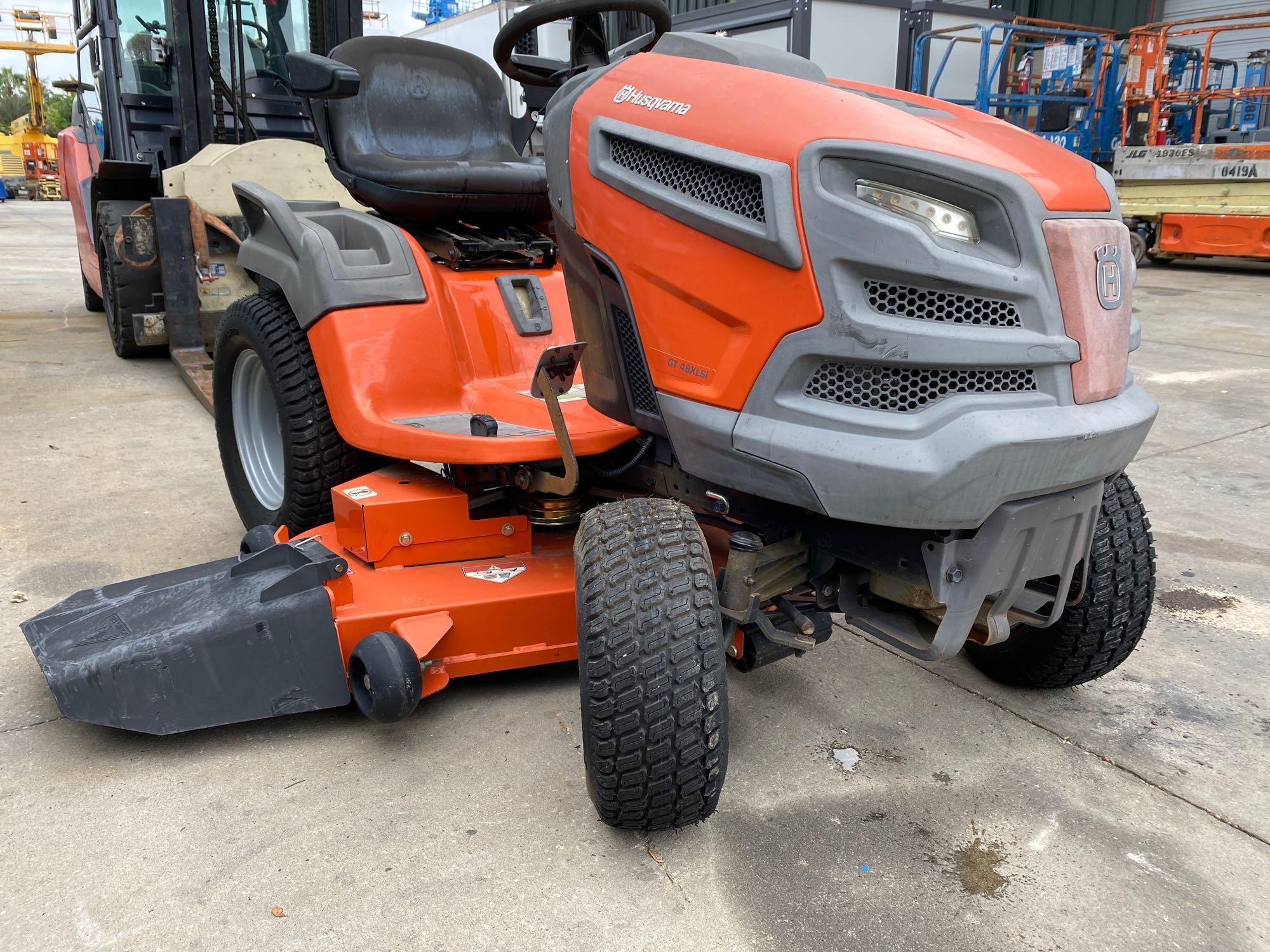 HUSQVARNA GT 48XLSi RIDING MOWER-UNUSED BUT WEATHERED FROM SITTING OUTSIDE