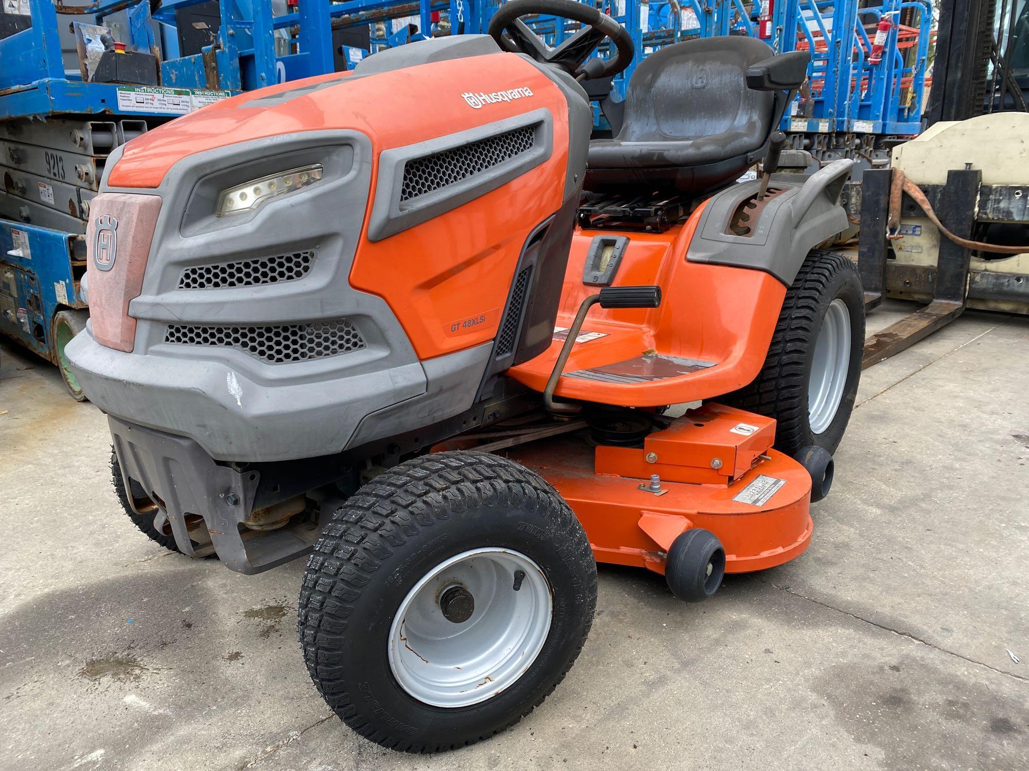 HUSQVARNA GT 48XLSi RIDING MOWER-UNUSED BUT WEATHERED FROM SITTING OUTSIDE