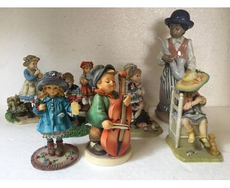 Eight various figures to include Lladro (instrument at fault), Goebel (instrument at fault) and The Leonardo Collection 