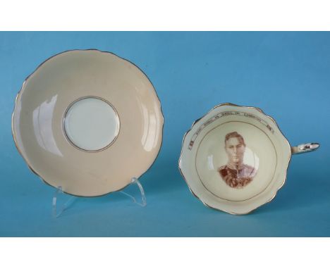 A good and rare Paragon Patriotic Series cup and saucer with portrait of George VI inscribed ‘The King is still in London’ (2