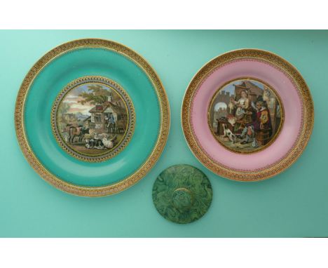 A malachite ground lid for a tobacco jar, slightly domed with a capstan type knop. 85mm diameter. Small chip to underside, a 