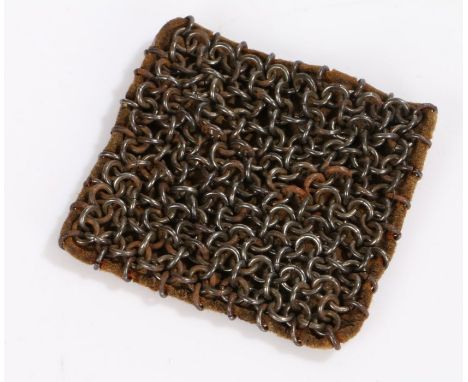 Unusual item, chainmail metal cleaner, a square of chainmail attached to a leather pad, used by armourers and cutlers to clea