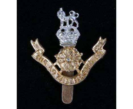 Scarce British army cap badge in anodised aluminium to The Loyal Regiment (North Lancashire), pre 1952 Kings crown, slider to
