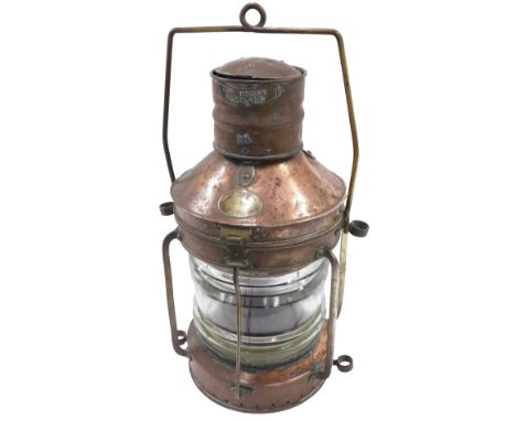 A Shire Trawlers Limited of Grimsby copper and brass ship's lamp, 55cm high. (AF)
