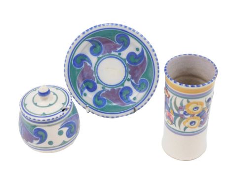 A Poole pottery cylindrical vase, decorated with typical flowers, 15cm high, and a Poole Carter Staebler and Adams preserve j