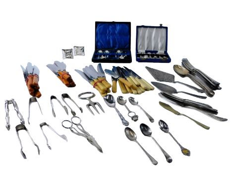 A group of simulated bone and other handles flatware, together with a pair of cased silver plated napkin rings, set of six pl