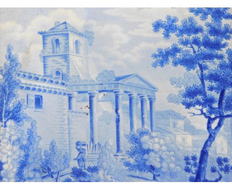 A 19thC tile, printed in blue with a building, figure on horseback, etc., 15cm high.