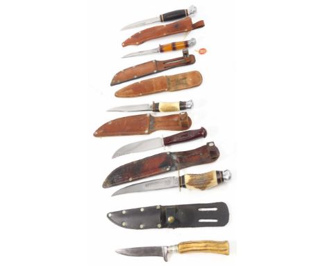 A selection of hunting knives, one with antler handle, made in Sheffield England, one with antler handle made by Edge Brand S