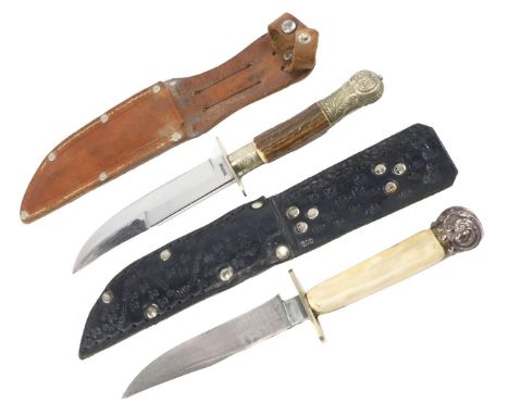 A pair of antler handled hunting knives, with white metal fittings, one blade marked FR Plucker Junior Solingen.