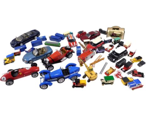 Diecast vehicles, to include a Maisto Jaguar XJ220, a Ferrari 500, Burago Mercedes Benz SSK, a Rastar Mini Cooper S, etc. (a 
