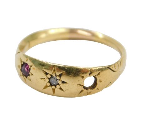 A Victorian ruby and diamond three stone gypsy ring, one ruby lacking, in a yellow metal shank, bears indistinct marks, size 