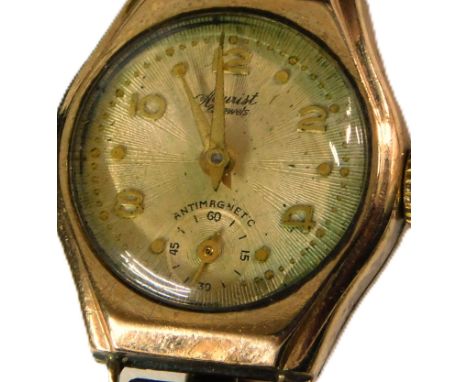 A mid century Accurist ladies 9ct rose gold cased wristwatch, circular engine turned champagne dial, bearing Arabic numerals 