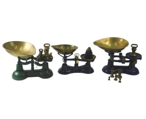 Two blue enamel coloured sets of scales, with weights, and a green set stamped Thornton &amp; Co Limited The Viking. (3)
