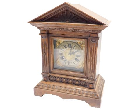 A late 19th/early 20thC German mantel clock, square dial with gilt spandrels and Roman numerals, with eight day movement, in 