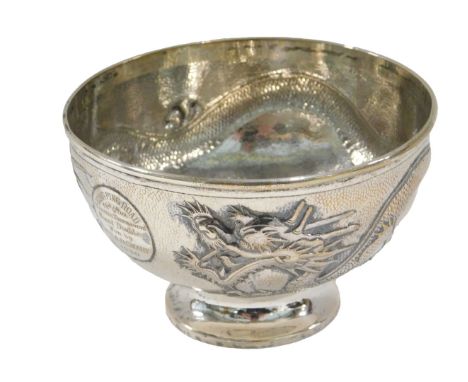 A Chinese silver bowl, decorated with a dragon and engraved King Ping Road, Tennis Tournament Mixed Doubles Won by Mrs AD Sma