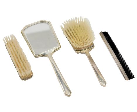 An Elizabeth II silver four piece dressing table set, with engine turned decoration, in art deco style, comprising mirror, ha