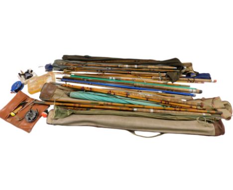 A quantity of vintage and other fishing rods, to include a Mordex ideal eight foot bamboo rod, other similar rods, a Billy La