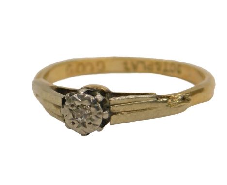 A diamond solitaire ring, claw set, in white and yellow metal, stamped 9ct and plat, size K½, 1.7g.