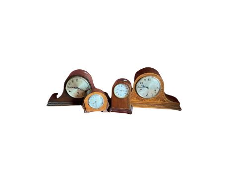 An Edwardian mantel clock in inlaid case, a similar shape clock, a Ferranti electric clock and an early 20th century inlaid m