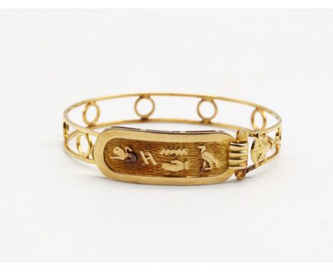 Unmarked Yellow Metal Bangle with Egyptian Symbols The Bangle has Egyptian Symbols on the front of the Bangle The Bangle has 