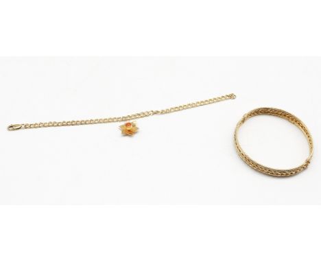 Two pieces of 9ct Gold Jewellery. To include a Clogau 9ct Gold Daffodil Charm on a 9ct Gold Bracelet.  The Clogau 9ct Gold Da