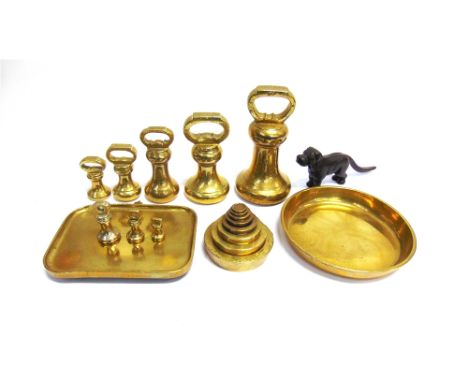 A GROUP OF ASSORTED BRASS WEIGHTS  including a graduated set of eight circular brass weights ranging from 1/2oz. to 4lb., eig