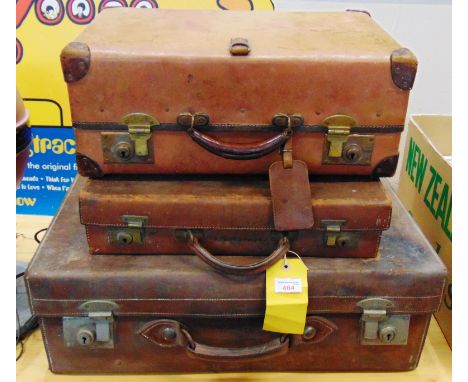 AN ARMY &amp; NAVY STORES COMPRESSED BOARD SHOE CASE  32cm x 48.5cm x 19cm; together with two leather cases. 