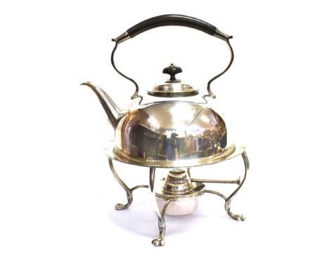 AN EARLY 20TH PLATED TEA KETLLE ON A STAND WITH A LAMP BY HUKIN &amp; HEATH the hemispherical kettle with a fixed ebonised ha