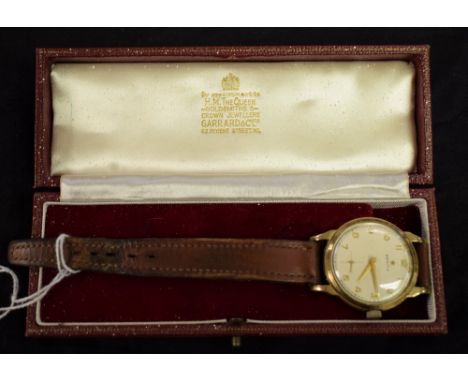 A gentleman's Zenith 9ct gold watch, presented for 25 years service in 1964, Garrard and Co Ltd box